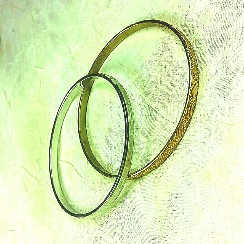 2 bangle bracelets 1 silver 1 gold tone